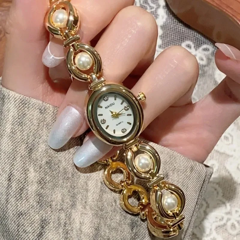 Элегантные овальные винтажные высокоупорные женские кварцевые часы, роскошные сенсационные минималистичные жемчужные браслеты, стильные часы, женские подарки
Элегантные овальные винтажные высокоупорные женские кварцевые часы, роскошные сенсационные минималистичные жемчужные браслеты, стильные часы, женские подарки