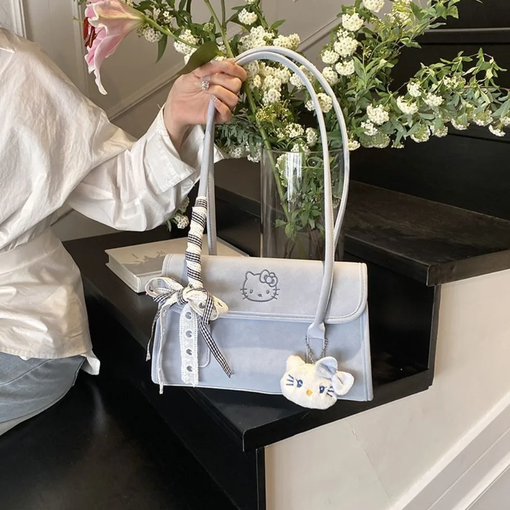 Hello Kitty Shoulder Bag Cute Cartoon High-capacity with Pendant Underarm Bag Fashion Delicate Advanced Feeling Commute Handbag
Hello Kitty Shoulder Bag Cute Cartoon High-capacity with Pendant Underarm Bag Fashion Delicate Advanced Feeling Commute Handbag