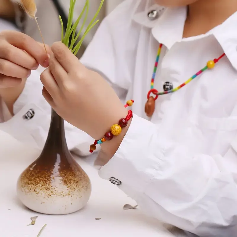 UMQ Cinnabar Red Orpiment Mahogany Bracelet Children's Male and Female Transfer Beads Colorful Braided Rope Dorje Knot Ornament
UMQ Cinnabar Red Orpiment Mahogany Bracelet Children's Male and Female Transfer Beads Colorful Braided Rope Dorje Knot Ornament