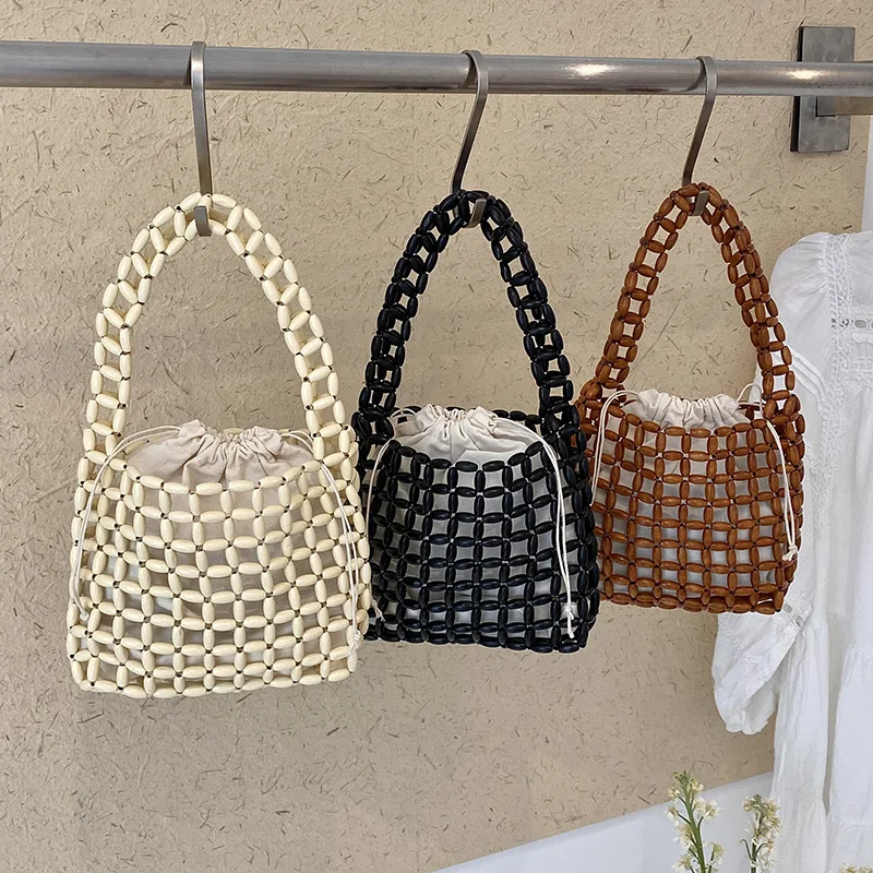2026 New Bohemian-style Woven Wooden Bead Handbag, A Fashionable and Versatile Lightweight Stringed Handbag Suitable for Ladies
2026 New Bohemian-style Woven Wooden Bead Handbag, A Fashionable and Versatile Lightweight Stringed Handbag Suitable for Ladies