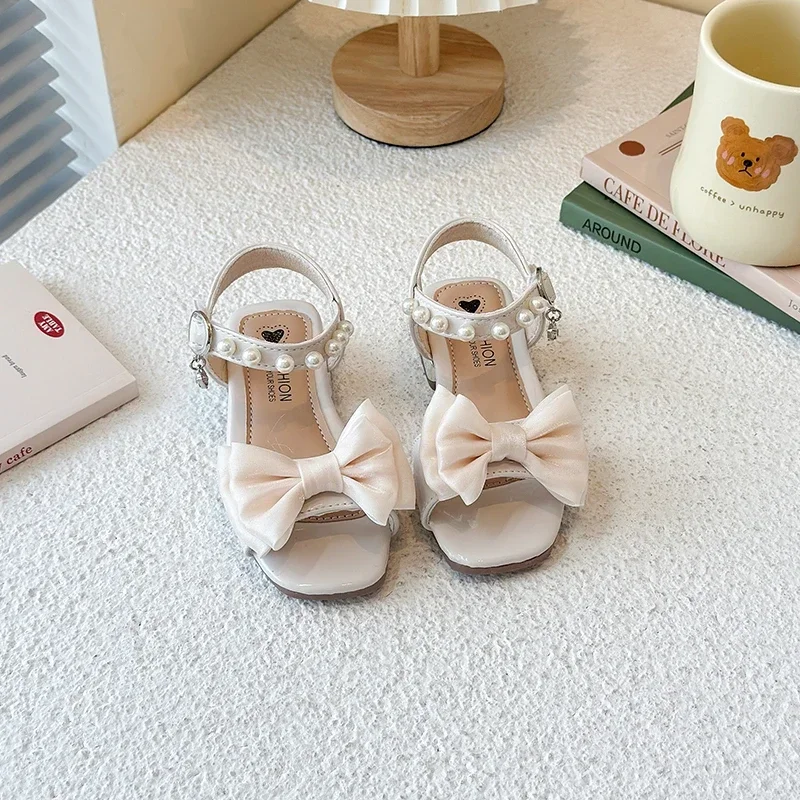 Girls Princess Sandals Sweet Elegant Kids Sandals Dance Wedding Non-slip 2025 Summer New Girls Dress Shoes Big Bows Ins Trendy
Girls Princess Sandals Sweet Elegant Kids Sandals Dance Wedding Non-slip 2025 Summer New Girls Dress Shoes Big Bows Ins Trendy