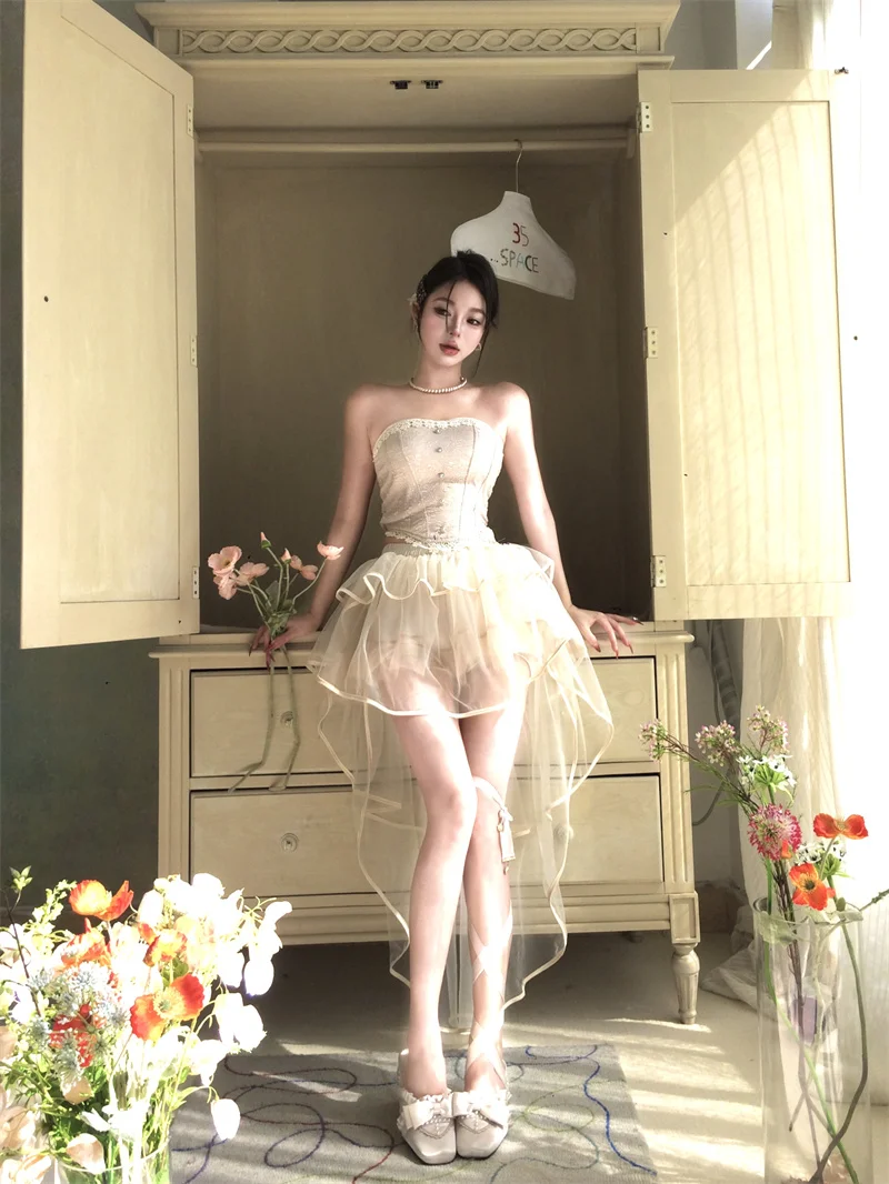 Sweet Hot Girl Suit Women's Summer Strapless Short Vest High Waist Mesh Tail A-line Skirt Two-piece Set Fashion Female Clothes
Sweet Hot Girl Suit Women's Summer Strapless Short Vest High Waist Mesh Tail A-line Skirt Two-piece Set Fashion Female Clothes