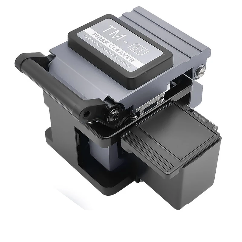 TM-6 TAutomatic retraction Blade High Precision Cleaver FTTH Optical Fiber Cleaver With Waster Box
TM-6 TAutomatic retraction Blade High Precision Cleaver FTTH Optical Fiber Cleaver With Waster Box