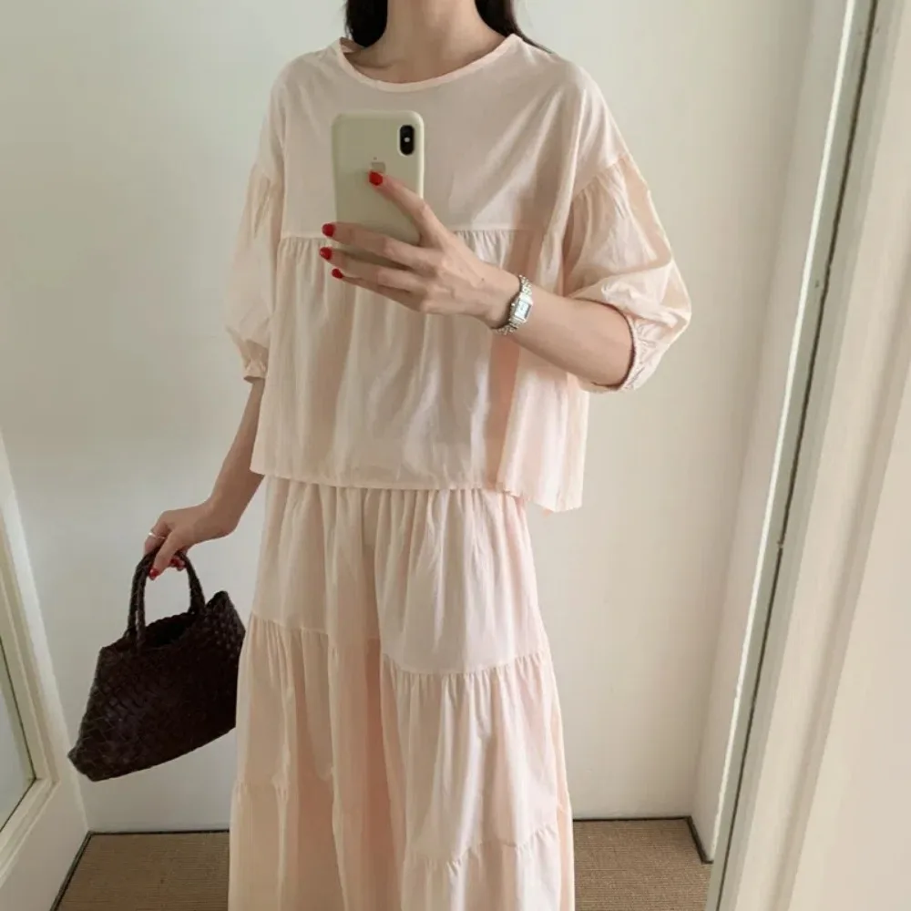 Oversized Sweet Two Pieces Set Women Summer Lightweight Round Collar Loose Shirt and Elastic High Waist Pleat Skirt 2025
Oversized Sweet Two Pieces Set Women Summer Lightweight Round Collar Loose Shirt and Elastic High Waist Pleat Skirt 2025
