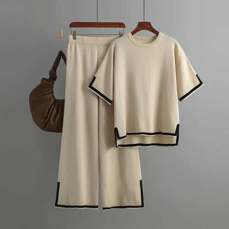Women Two Piece Set Knit Sweater Suit Short Sleeve Round Neck Tops Loose Wide Leg Pants Solid Splice Midi Waist Casual
Women Two Piece Set Knit Sweater Suit Short Sleeve Round Neck Tops Loose Wide Leg Pants Solid Splice Midi Waist Casual