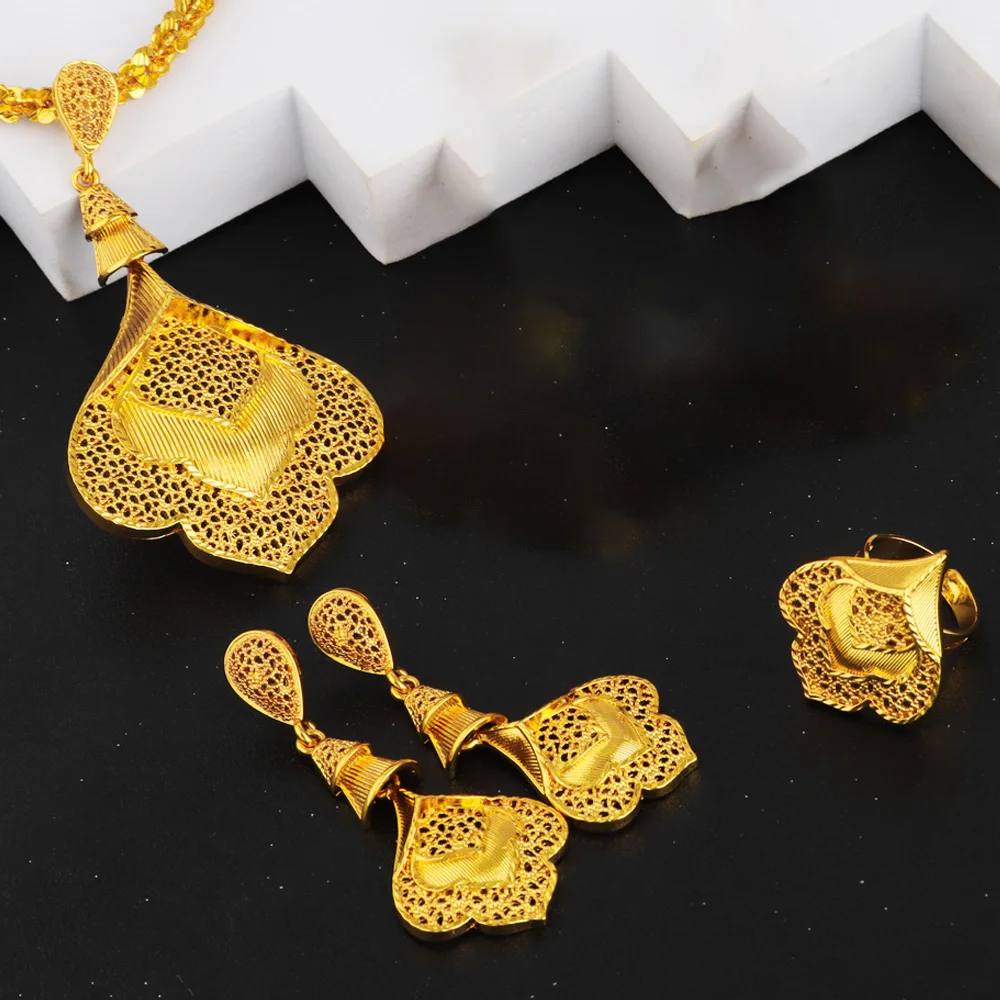 Ethiopia Vintage Gold Color Women Jewelry Set Hollow Out Flower Necklace Ring Drop Earrings For Bridal Party Wedding Easter Gift
Ethiopia Vintage Gold Color Women Jewelry Set Hollow Out Flower Necklace Ring Drop Earrings For Bridal Party Wedding Easter Gift