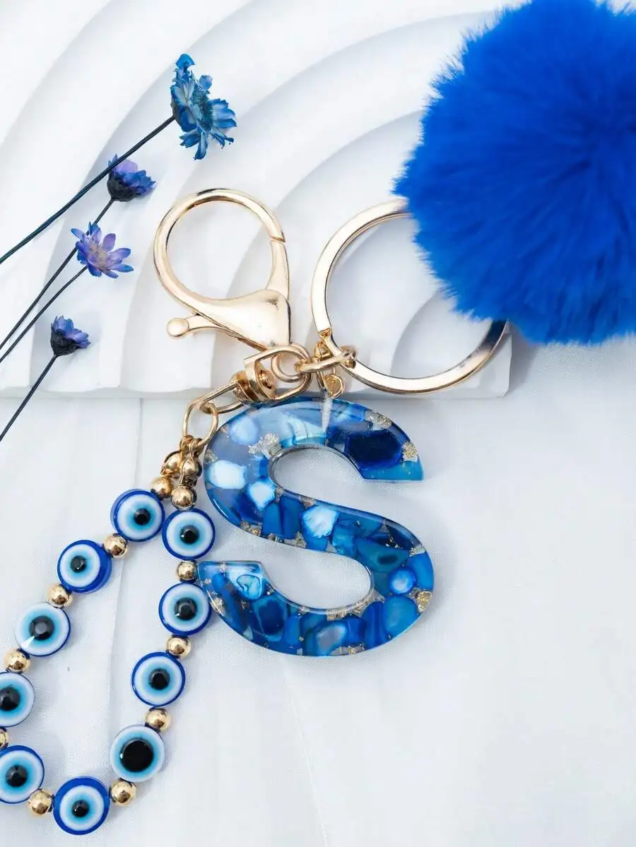 Bohemian Resin Letter S Keychain With Blue Evil Eye Beads And Faux Fur Pom Pom
Bohemian Resin Letter S Keychain With Blue Evil Eye Beads And Faux Fur Pom Pom