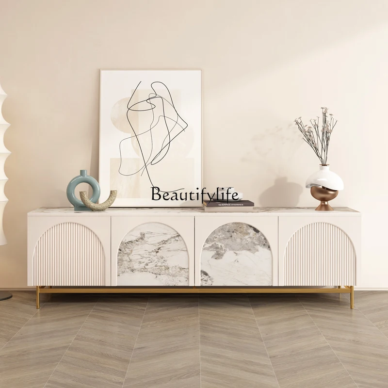 French light luxury TV cabinet Italian simple villa living room cream wind high-end new rock slab floor cabinet
French light luxury TV cabinet Italian simple villa living room cream wind high-end new rock slab floor cabinet
