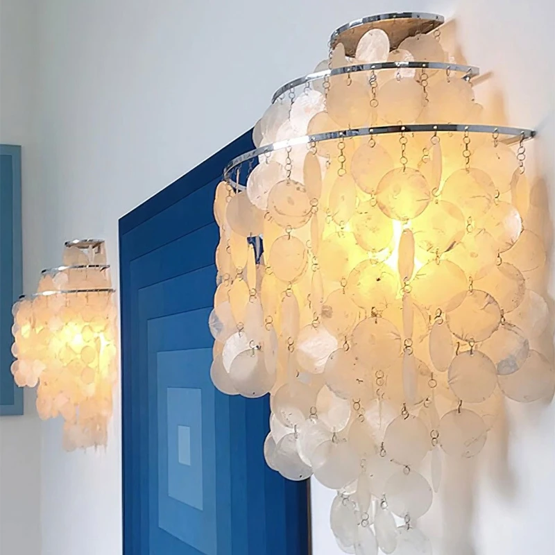 Датский дизайнерский настенный светильник с жемчужной ракушкой Романтический художественный декоративный интерьер Кремовый настенный светильник Коридор Гостиная Столовая Спальня
Датский дизайнерский настенный светильник с жемчужной ракушкой Романтический художественный декоративный интерьер Кремовый настенный светильник Коридор Гостиная Столовая Спальня