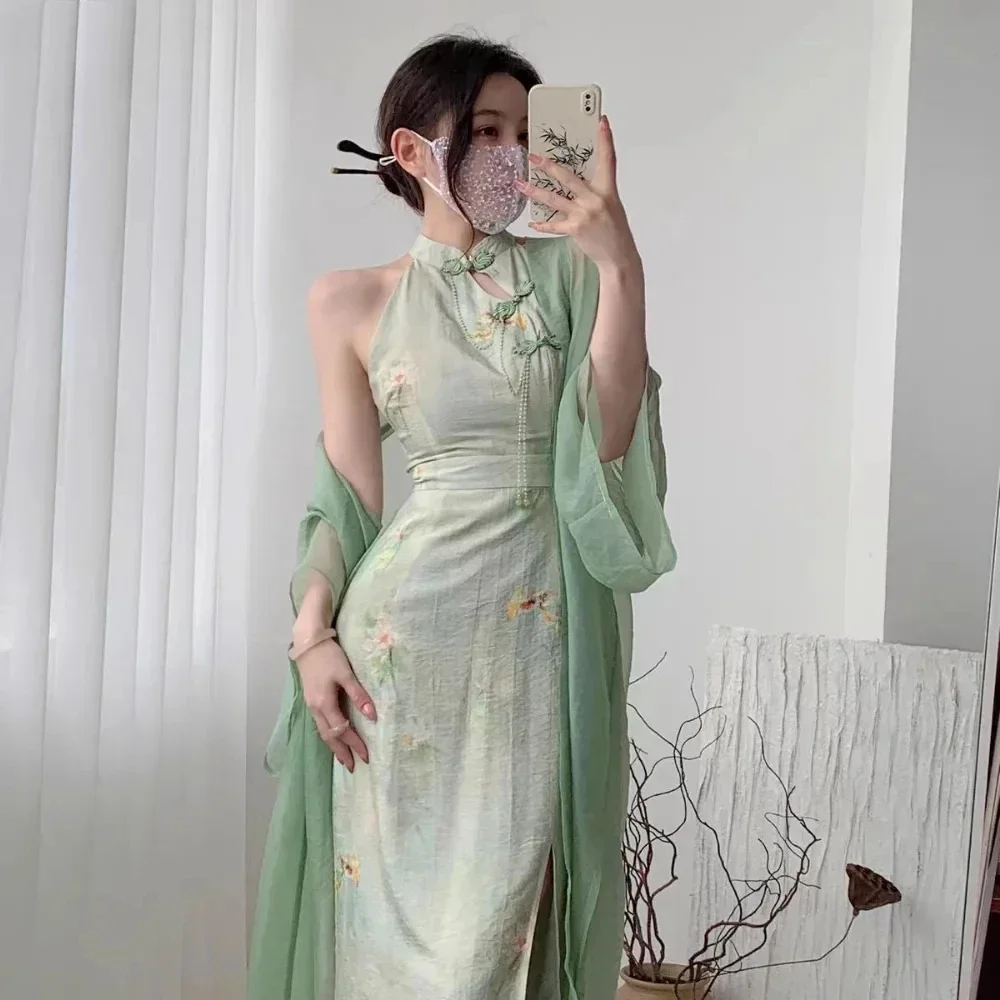 Зеленое улучшенное платье Cheongsam для женщин, новый китайский стиль, чистый и Ципао, дзен, как темперамент, висит на шее, талии, облегающий крой
Зеленое улучшенное платье Cheongsam для женщин, новый китайский стиль, чистый и Ципао, дзен, как темперамент, висит на шее, талии, облегающий крой