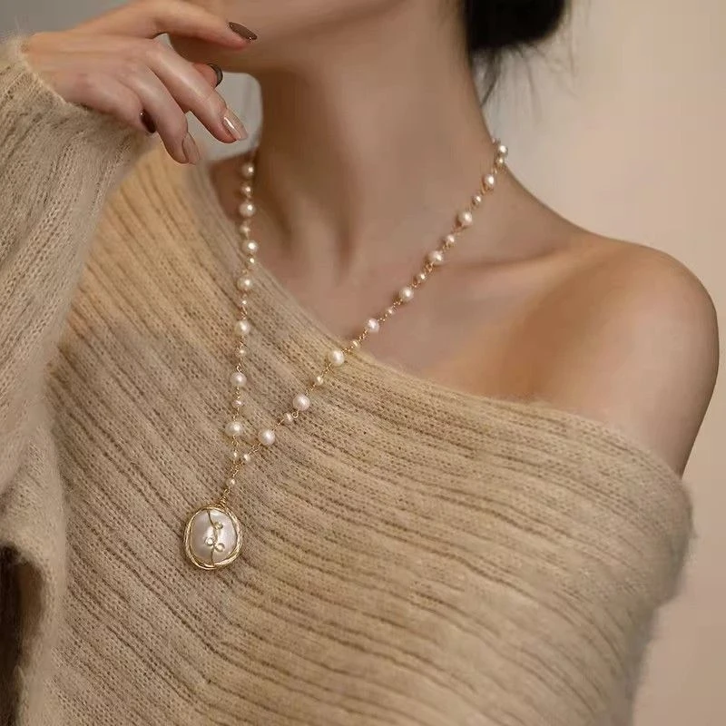 Simple18Kgold Twisted Silk Large Imitation Pearl Tassel Necklace, Niche Design, High-end New Model, Light Luxury Versatile Neckl
Simple18Kgold Twisted Silk Large Imitation Pearl Tassel Necklace, Niche Design, High-end New Model, Light Luxury Versatile Neckl
