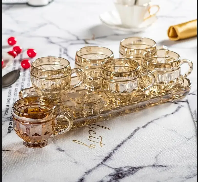 Стеклянная чашка с ручкой для воды, набор из 6 предметов, лоток, кружка для молока, сок, чай, домашняя послеобеденная посуда, наборы чайной посуды
Стеклянная чашка с ручкой для воды, набор из 6 предметов, лоток, кружка для молока, сок, чай, домашняя послеобеденная посуда, наборы чайной посуды