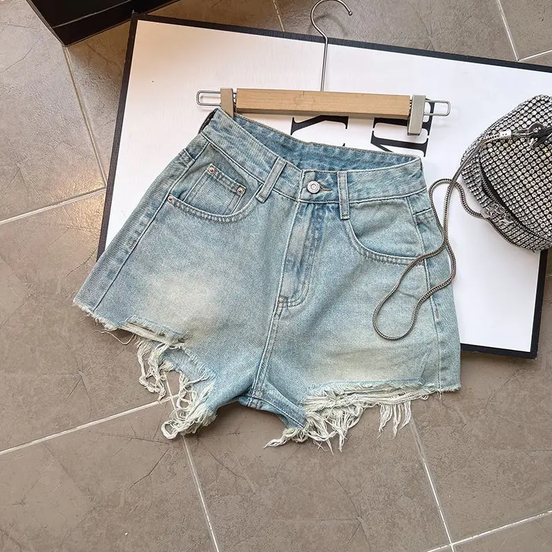 Ripped Denim Shorts Women's Summer Spice Girl High Waist Design A Word Rough Edge Hot Pants
Ripped Denim Shorts Women's Summer Spice Girl High Waist Design A Word Rough Edge Hot Pants