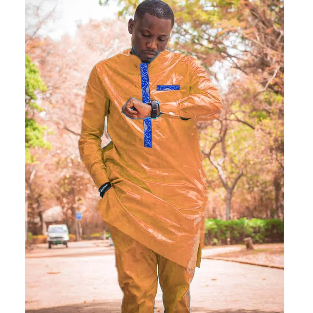 Новейшая золотая африканская одежда для мужчин, традиционный дизайн с вышивкой Bazin Riche, топ с длинными рукавами, комплект из 2 предметов, свадебная одежда для бассейна
Новейшая золотая африканская одежда для мужчин, традиционный дизайн с вышивкой Bazin Riche, топ с длинными рукавами, комплект из 2 предметов, свадебная одежда для бассейна