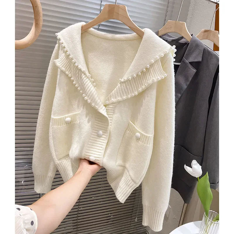 Spring Autumn New Vintage Pearl Sweater Navy Collar Knitted Cardigan Long Sleeve Jacket Clothes Loose Knitwear Tops Female B1269
Spring Autumn New Vintage Pearl Sweater Navy Collar Knitted Cardigan Long Sleeve Jacket Clothes Loose Knitwear Tops Female B1269