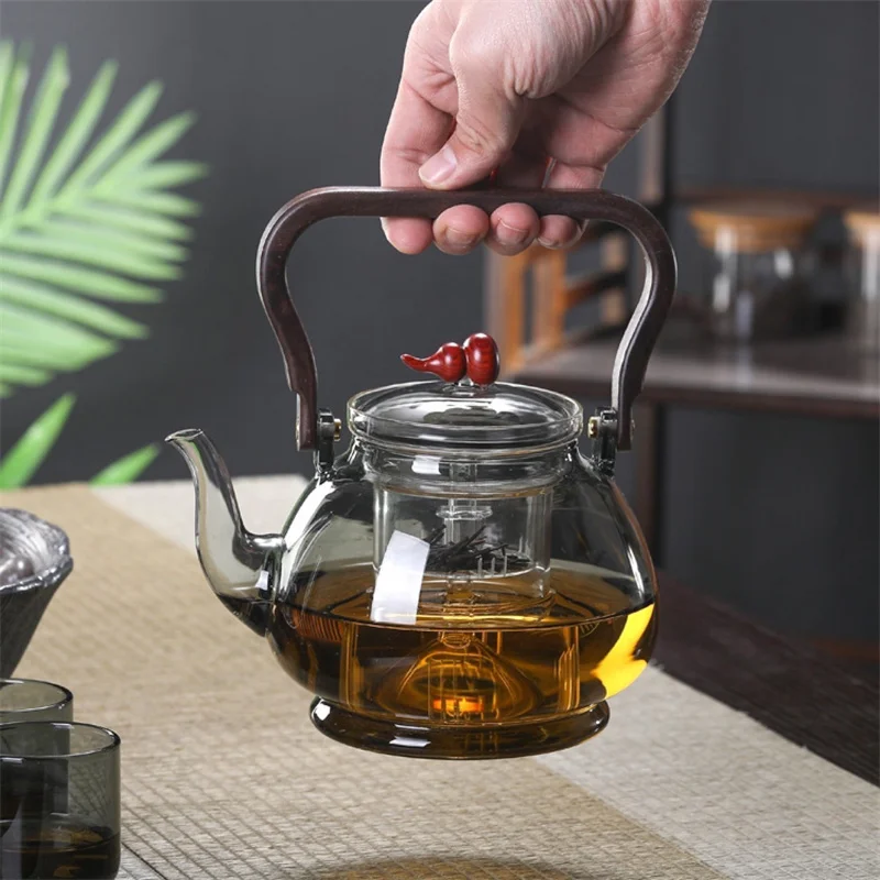 Large Capacity 1000ml Steaming and Boiling Heat-resistant Glass Teapots With Infuser Filter Wooden Handle Lifting Beam Tea Pot
Large Capacity 1000ml Steaming and Boiling Heat-resistant Glass Teapots With Infuser Filter Wooden Handle Lifting Beam Tea Pot