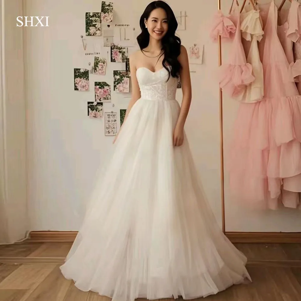 SHXI Spaghetti Straps Korea Wedding Dresses Sweetheart Ruched Tulle Photo Shoot Dress Customized Corset Ankle Length Bridal Gown
SHXI Spaghetti Straps Korea Wedding Dresses Sweetheart Ruched Tulle Photo Shoot Dress Customized Corset Ankle Length Bridal Gown