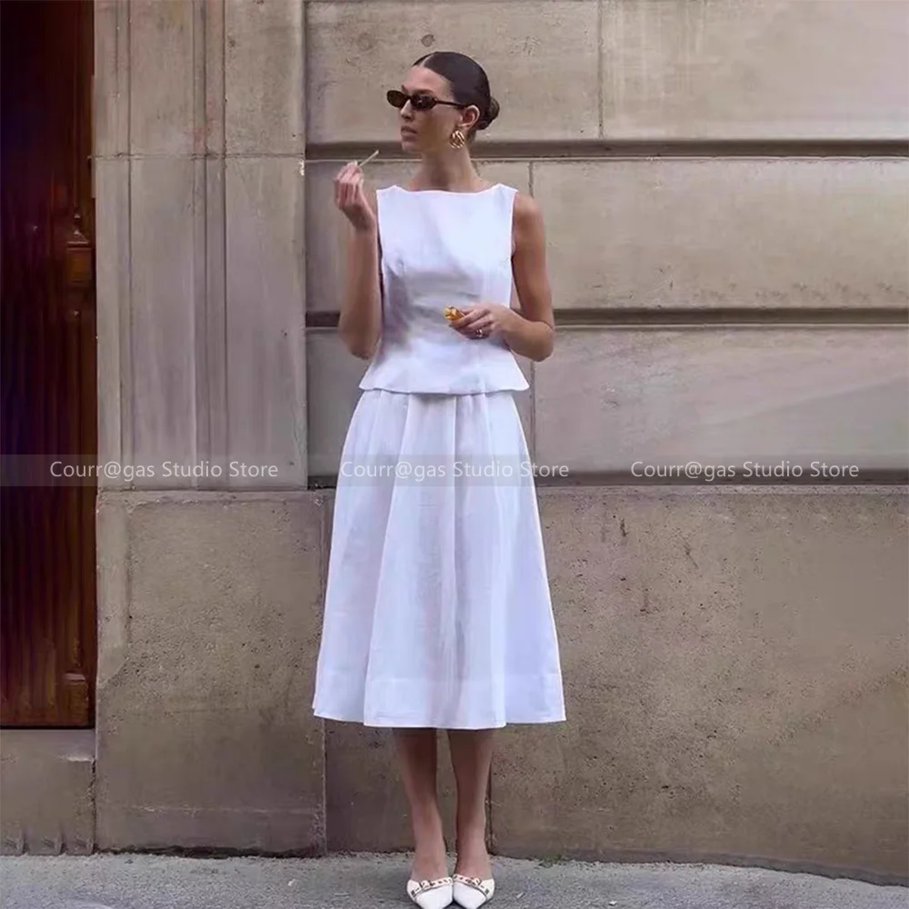 New summer temperament sleeveless waist linen vest + high waist umbrella skirt A-line half-body skirt suit
New summer temperament sleeveless waist linen vest + high waist umbrella skirt A-line half-body skirt suit