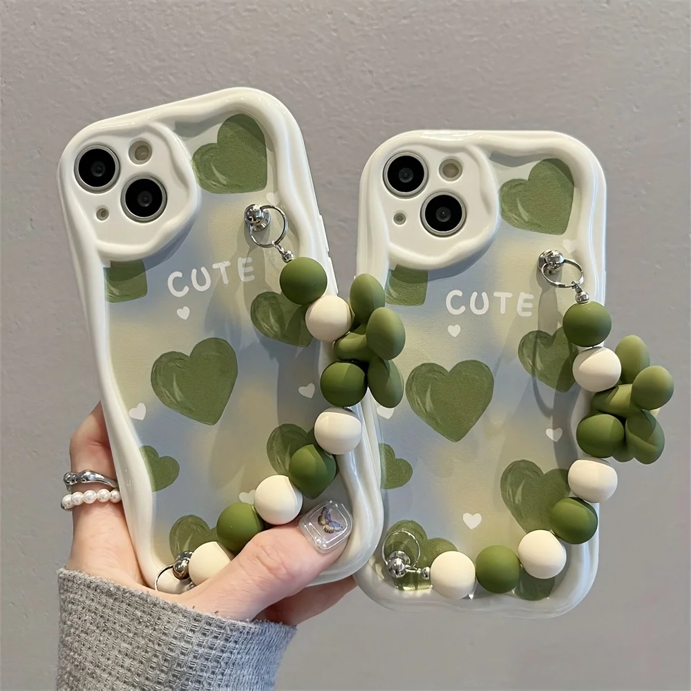 Чехол для iPhone 17promax/16plus с цепочкой из зеленого сердца и бусин в полоску из натурального крема, мягкая задняя крышка
Чехол для iPhone 17promax/16plus с цепочкой из зеленого сердца и бусин в полоску из натурального крема, мягкая задняя крышка