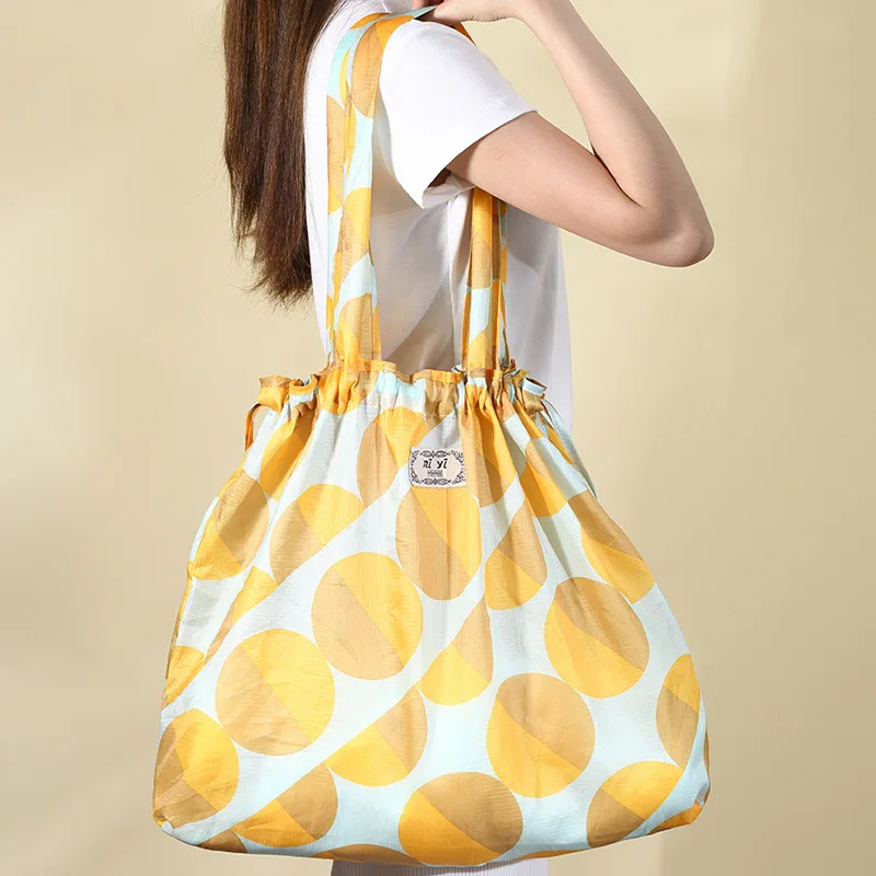 Storage bag Nylon Shoulder bag Foldable Large Capacity Casual Shopping durable Portable reusable bags Drawstring supermarket bag
Storage bag Nylon Shoulder bag Foldable Large Capacity Casual Shopping durable Portable reusable bags Drawstring supermarket bag