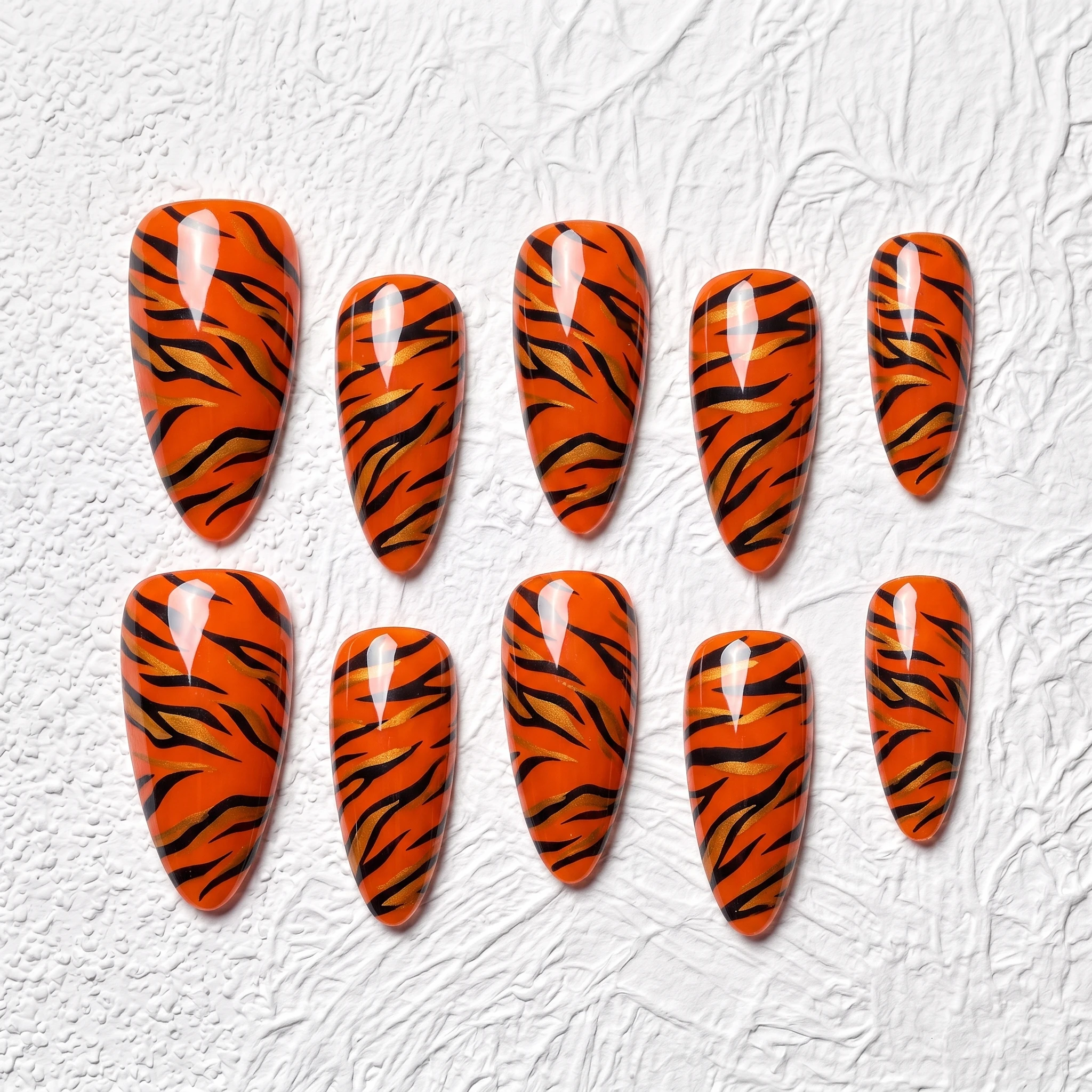 Artisan Handcrafted 10PCS Tiger Print Almond Press-On Nails | Orange Base, Black & Gold Stripes, Glazed Finish, Party & Holiday
Artisan Handcrafted 10PCS Tiger Print Almond Press-On Nails | Orange Base, Black & Gold Stripes, Glazed Finish, Party & Holiday