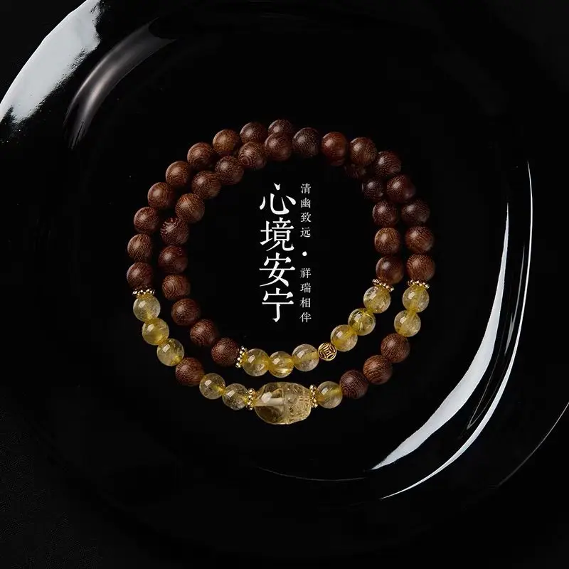 Оригинальный новый китайский браслет с желтыми кристаллами из сандалового дерева, привлекательность богатства Pixiu и транспортировка, двойной круг, ювелирные изделия для рук
Оригинальный новый китайский браслет с желтыми кристаллами из сандалового дерева, привлекательность богатства Pixiu и транспортировка, двойной круг, ювелирные изделия для рук