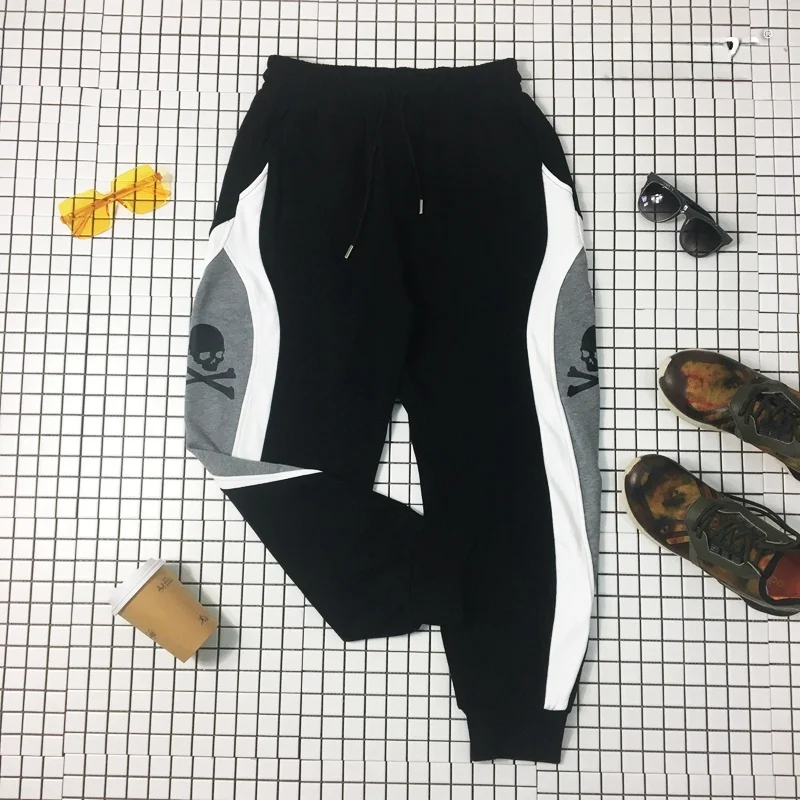 Street Style Skull Print Elastic Waist Cotton Sports Pants Men's Loose Fit Long Trousers Thin Cotton Pure Color Block Design
Street Style Skull Print Elastic Waist Cotton Sports Pants Men's Loose Fit Long Trousers Thin Cotton Pure Color Block Design