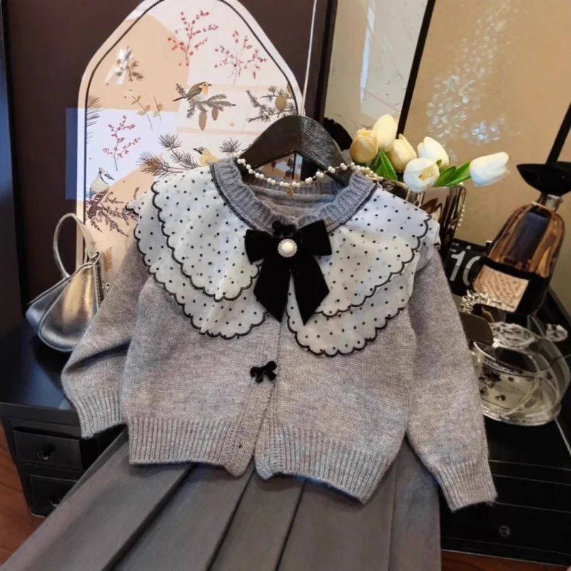 Girls' Spring and Autumn Outfit Set2025New stylish little girl bowknot doll collar knit sweater pleated skirt set
Girls' Spring and Autumn Outfit Set2025New stylish little girl bowknot doll collar knit sweater pleated skirt set