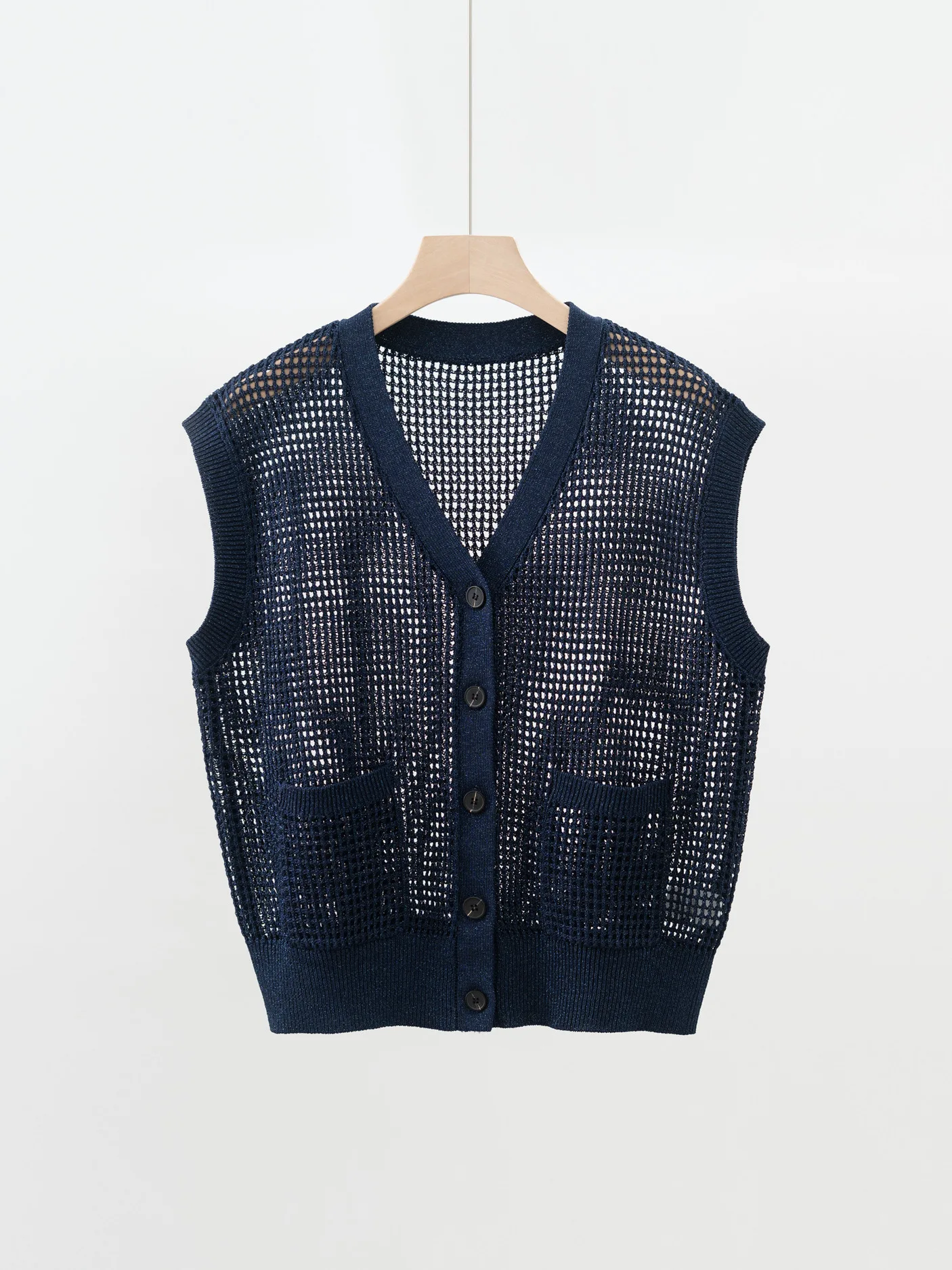 Women's 2026 Spring and Summer New V-neck Hollow Knitted Vest Top
Women's 2026 Spring and Summer New V-neck Hollow Knitted Vest Top