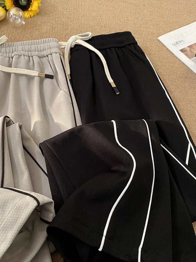Men's Summer Thin Dstring Stripe Sports Pants Casual Trendy Brand Breathable Long Straight Tube Polyester Fiber Micro Stretch
Men's Summer Thin Dstring Stripe Sports Pants Casual Trendy Brand Breathable Long Straight Tube Polyester Fiber Micro Stretch