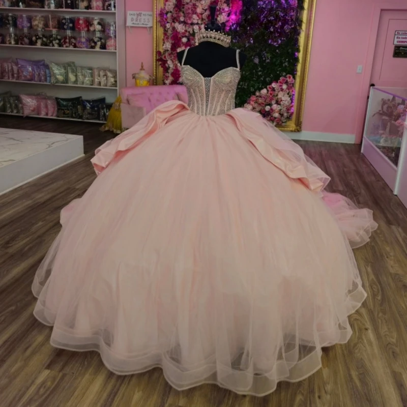 Pink Quinceanera Dresses Spaghetti Strap Ball Gown Sweet 16 Dress Bow Beading Crystal Tull Birthday Party Vestidos 15 De Anos
Pink Quinceanera Dresses Spaghetti Strap Ball Gown Sweet 16 Dress Bow Beading Crystal Tull Birthday Party Vestidos 15 De Anos
