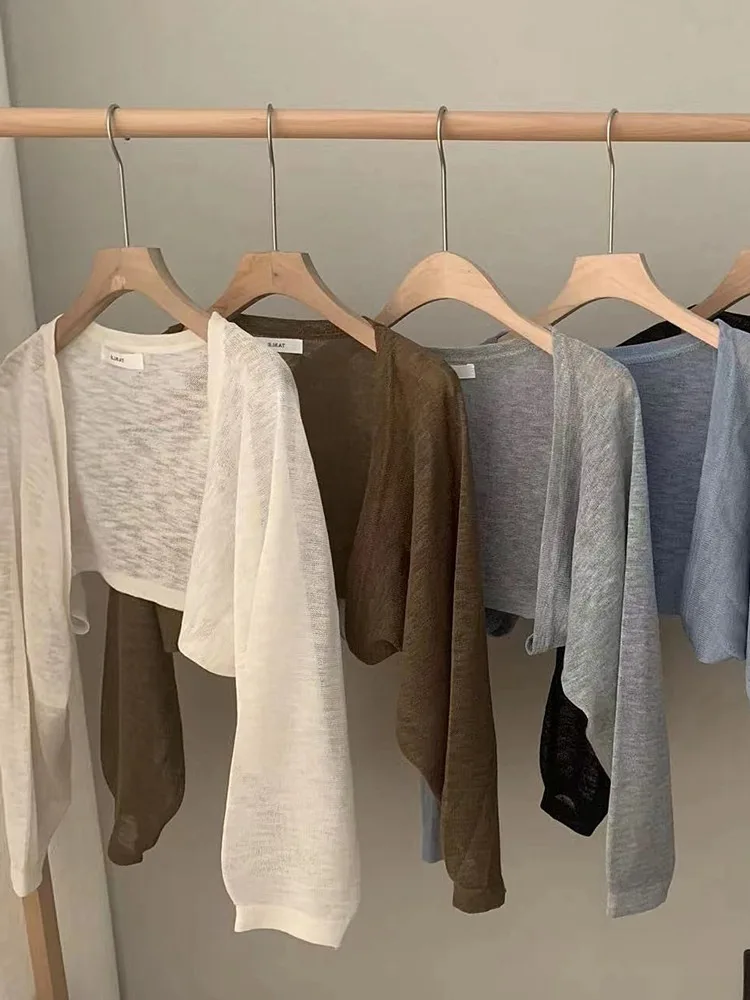 Summer Ice Silk Knitted Short Thin Cardigan Shawl Women's Fashion V-neck Open-front Long Sleeve Loose Fit Color Coat
Summer Ice Silk Knitted Short Thin Cardigan Shawl Women's Fashion V-neck Open-front Long Sleeve Loose Fit Color Coat