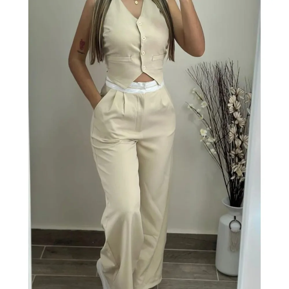Elegant Women's Two Piece Set V-Neck Buttoned Vest Top and Contrast Paneled High Waist Pocket Design Wide Leg Pants Set
Elegant Women's Two Piece Set V-Neck Buttoned Vest Top and Contrast Paneled High Waist Pocket Design Wide Leg Pants Set