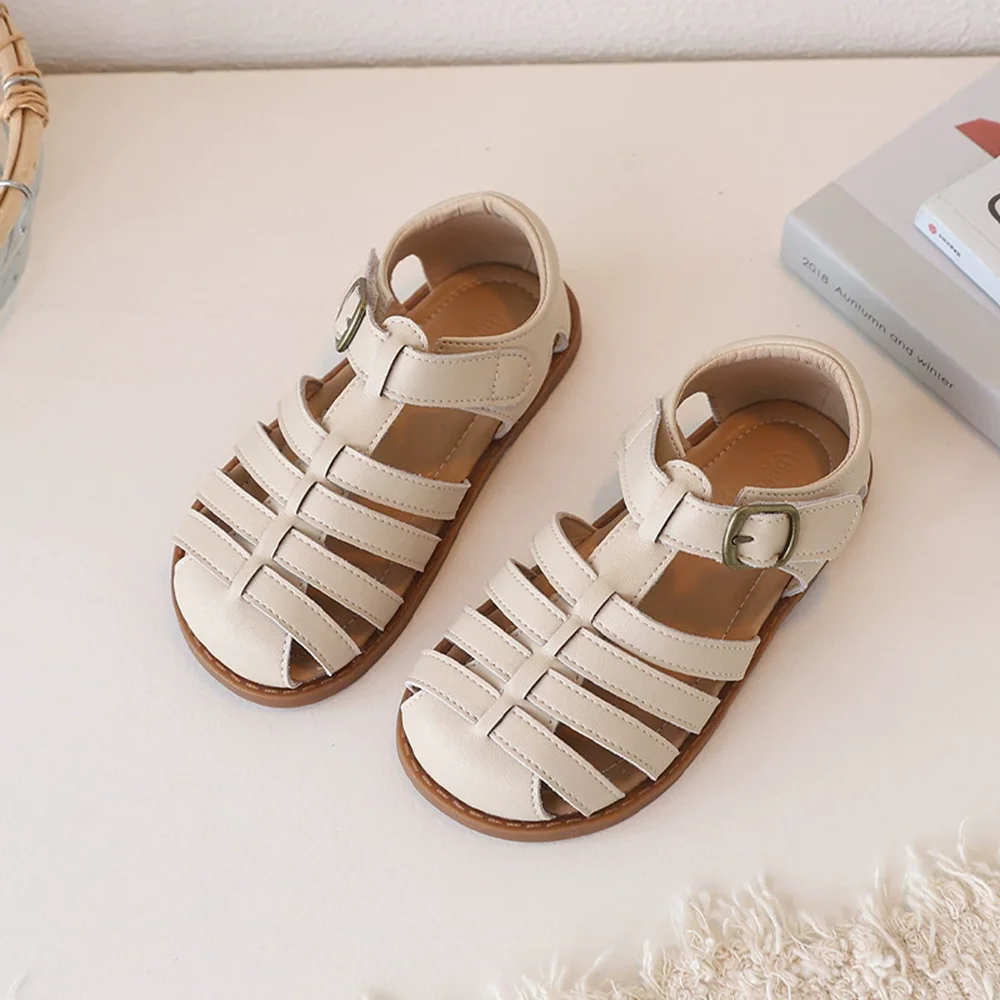 Genuine leather Korean-style woven girls' sandals, Roman hollowed-out summer baby shoes, versatile boys' beach sandals
Genuine leather Korean-style woven girls' sandals, Roman hollowed-out summer baby shoes, versatile boys' beach sandals