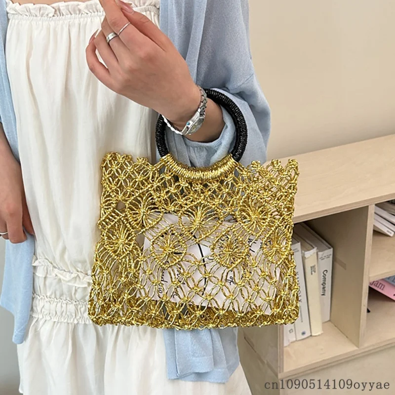 Summer Light Luxury Woven Bag Fashion Hollow Handbag Niche Design Round Hand-held Square Bags Versatile Gold Silver Holiday Bags
Summer Light Luxury Woven Bag Fashion Hollow Handbag Niche Design Round Hand-held Square Bags Versatile Gold Silver Holiday Bags