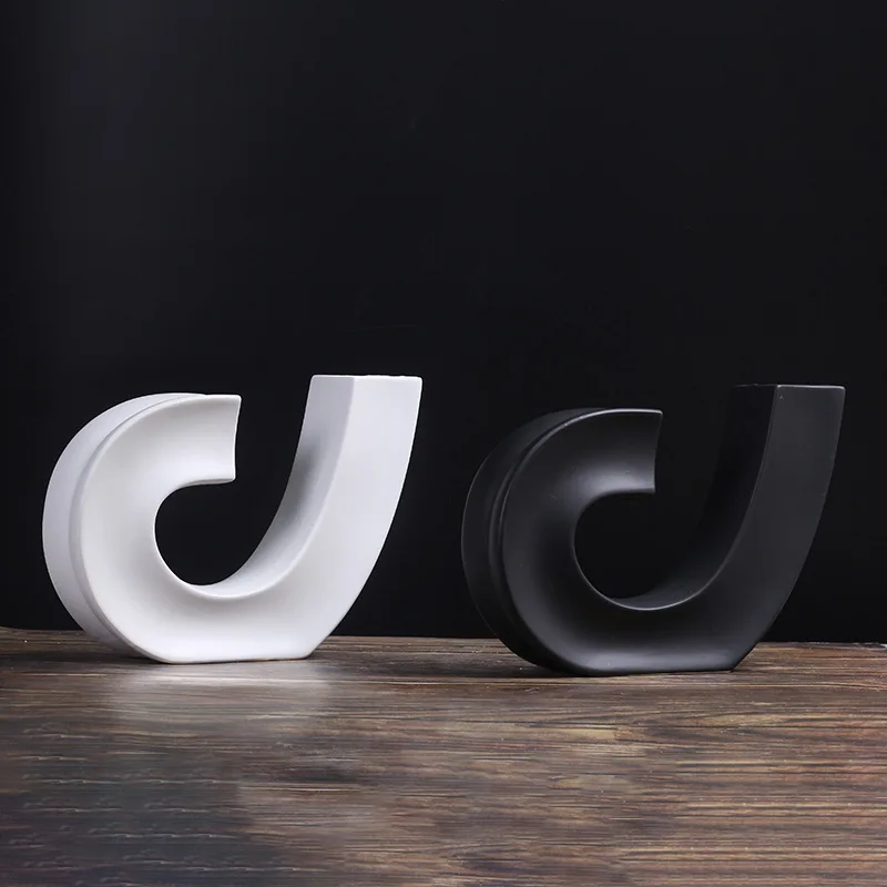 Black and white hook shaped musical note geometric ceramic flower arrangement simple Nordic home aesthetic decoration
Black and white hook shaped musical note geometric ceramic flower arrangement simple Nordic home aesthetic decoration