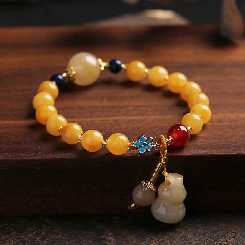 Natural Xinjiang Golden Silk Yellow , Gift for Best Friends, Small Gourd Tassel Women's Round Bead Jade Bracelet
Natural Xinjiang Golden Silk Yellow , Gift for Best Friends, Small Gourd Tassel Women's Round Bead Jade Bracelet