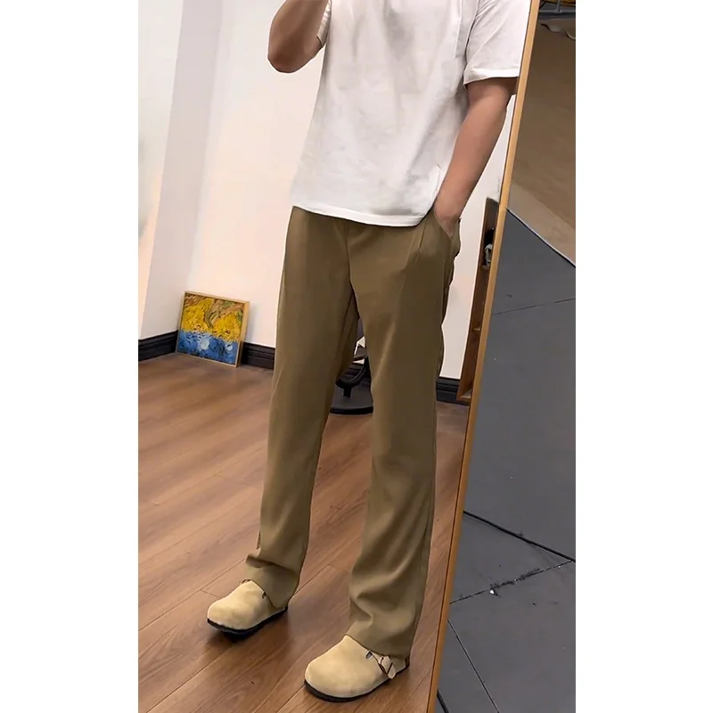 Мужские летние тонкие брюки прямого кроя из ледяного шелка цвета хаки, в западном стиле, с эффектом стройности, американского стиля, слегка расклешенные, с зауженным низом.
Мужские летние тонкие брюки прямого кроя из ледяного шелка цвета хаки, в западном стиле, с эффектом стройности, американского стиля, слегка расклешенные, с зауженным низом.