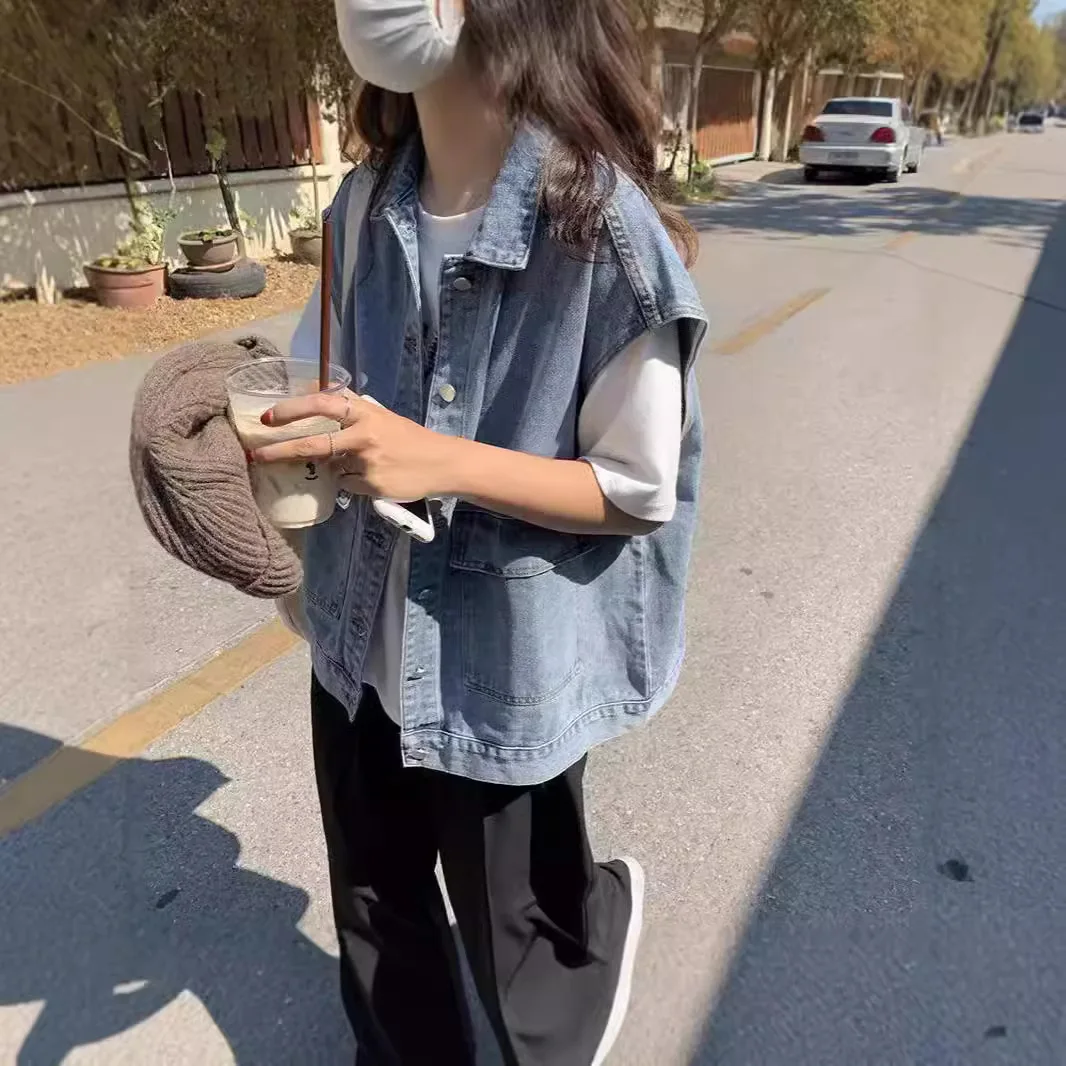 Casual Light Blue Denim Vest for Women, Loose Sleeveless Button-Down Jean Waistcoat, Streetwear Layered Top
Casual Light Blue Denim Vest for Women, Loose Sleeveless Button-Down Jean Waistcoat, Streetwear Layered Top