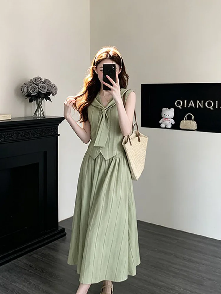 Elegant Navy Collar Embroidered Pleated Striped Top High Waist Skirt Two Piece Set Summer Fashion Women's Clothing Ensemble
Elegant Navy Collar Embroidered Pleated Striped Top High Waist Skirt Two Piece Set Summer Fashion Women's Clothing Ensemble
