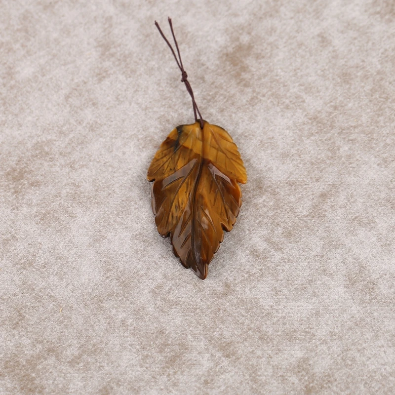 Handmade DIY Carved Leaf Pendant Tiger Eye Bead 54x31x4mm 7.7g for Jewelry Making Popular Style
Handmade DIY Carved Leaf Pendant Tiger Eye Bead 54x31x4mm 7.7g for Jewelry Making Popular Style