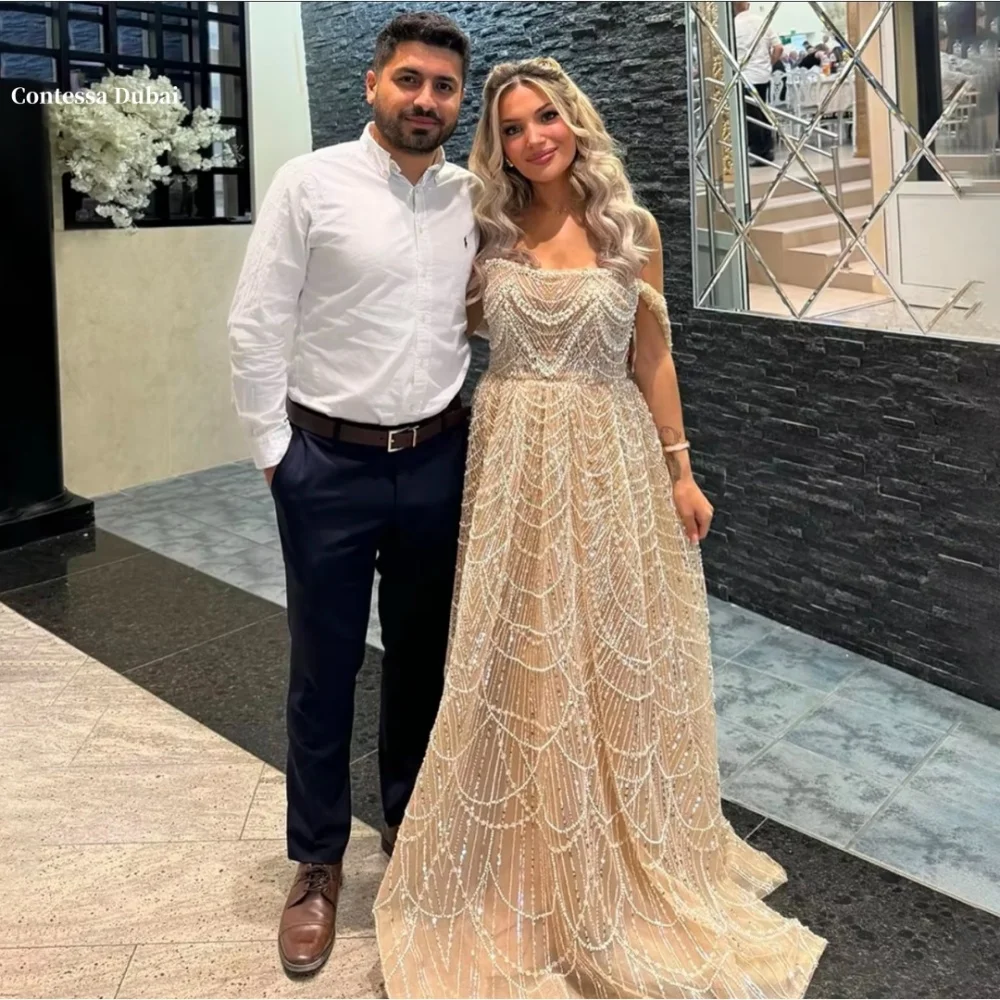Contessa Dubai Light Champagne Beaded Wedding Dress One Shoulder vestidos de noche Floor-Length فساتين سهرة Customized 2025
Contessa Dubai Light Champagne Beaded Wedding Dress One Shoulder vestidos de noche Floor-Length فساتين سهرة Customized 2025