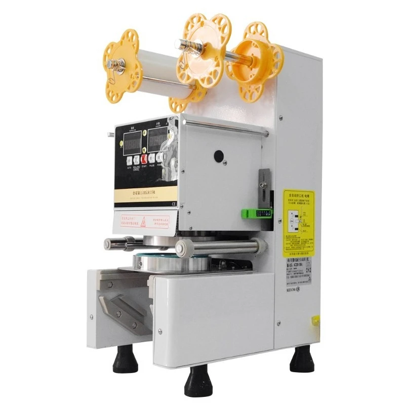 Milk tea sealing machine Automatic coffee beverage cup sealer Milk tea shop equipment 9095 caliber sealing machine
Milk tea sealing machine Automatic coffee beverage cup sealer Milk tea shop equipment 9095 caliber sealing machine