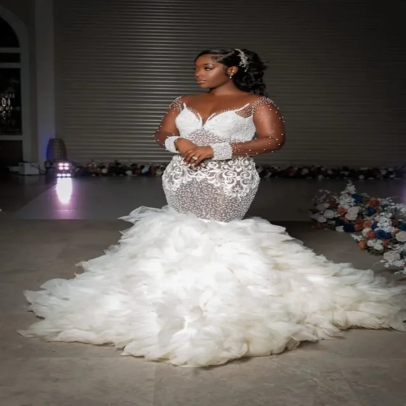 Customized Sparkly Pearls Embroidery Long Sleeves Wedding Dress With Removable Ruffles Skirt Plus Size African Bridal Gown
Customized Sparkly Pearls Embroidery Long Sleeves Wedding Dress With Removable Ruffles Skirt Plus Size African Bridal Gown