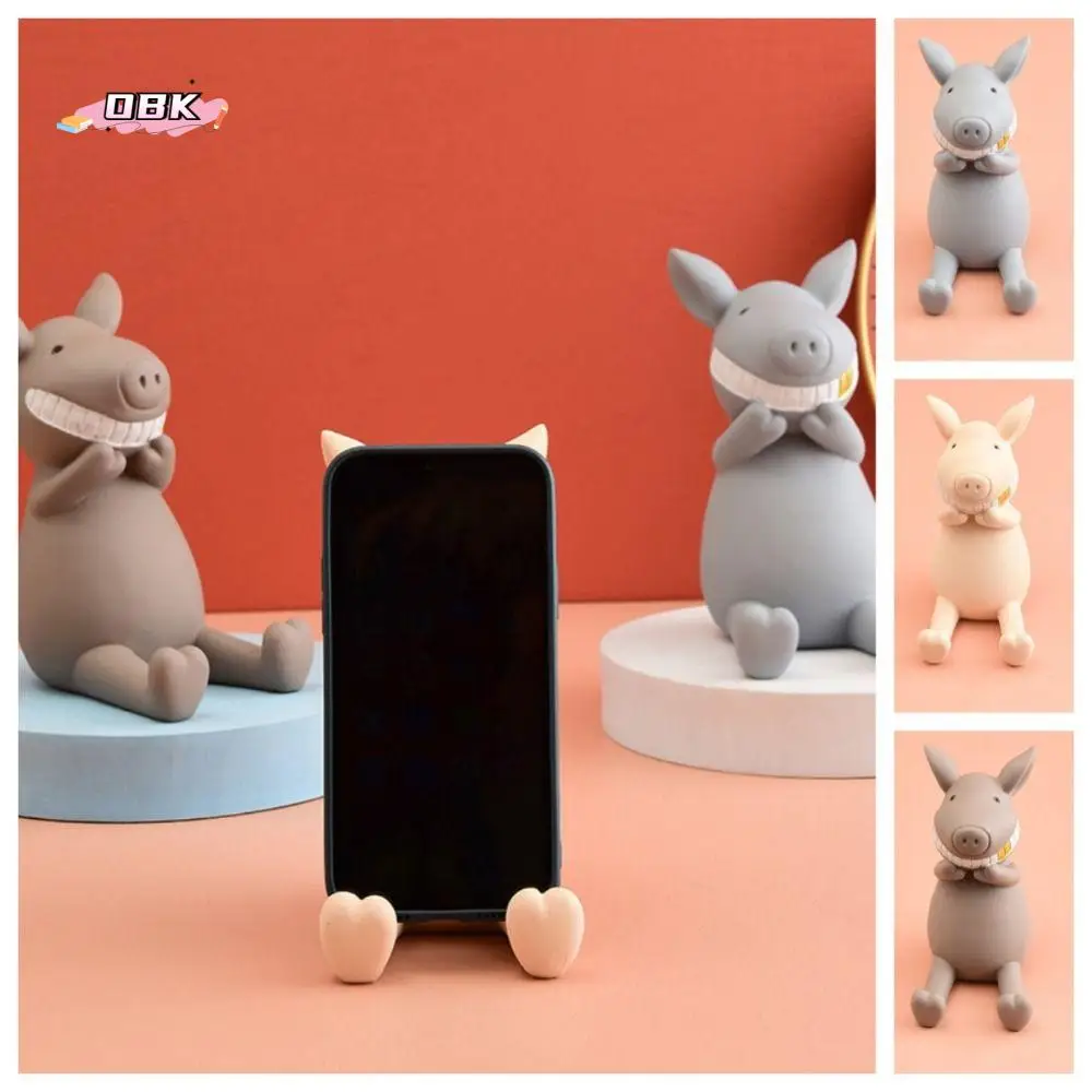 Resin Cartoon Phone Holder Anti-slip Figure Toys Pig Mobile Phone Stand Multi-functional Statue Cell Phone Bracket Desk Decor
Resin Cartoon Phone Holder Anti-slip Figure Toys Pig Mobile Phone Stand Multi-functional Statue Cell Phone Bracket Desk Decor