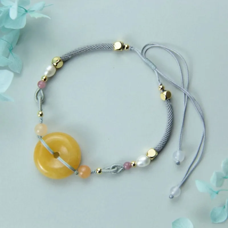Natural Gold Silk Jade Safety Buckle Hand Rope Women's Simple Hand-woven Bracelet
Natural Gold Silk Jade Safety Buckle Hand Rope Women's Simple Hand-woven Bracelet