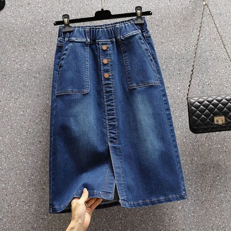 Summer New Women Elastic Waist Denim Skirts Korean Style Elegant Oversized High Waist Slit Skirts Mid Length Ladies Skirts
Summer New Women Elastic Waist Denim Skirts Korean Style Elegant Oversized High Waist Slit Skirts Mid Length Ladies Skirts