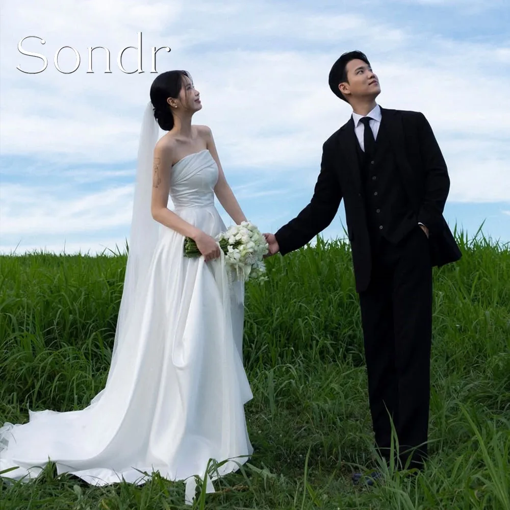 Sondr Customized Strapless A Line Korean Wedding Dresses Floor-Length Bridal Party Dress Simple A Line Wedding Snap Gown 2026
Sondr Customized Strapless A Line Korean Wedding Dresses Floor-Length Bridal Party Dress Simple A Line Wedding Snap Gown 2026