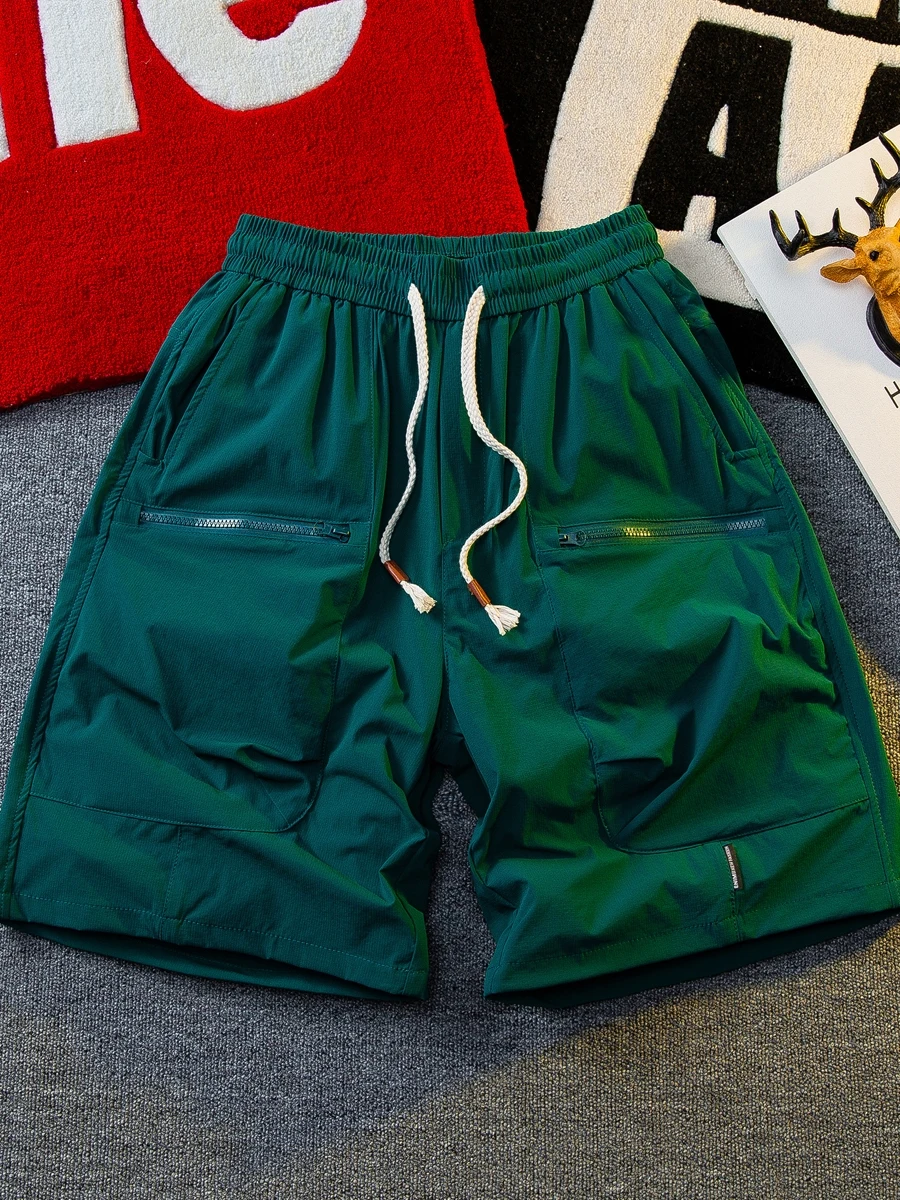 Шорты-карго мужские с карманами, модные тонкие однотонные штаны, повседневные свободные короткие брюки на шнуровке, K368, лето 2024
Шорты-карго мужские с карманами, модные тонкие однотонные штаны, повседневные свободные короткие брюки на шнуровке, K368, лето 2024