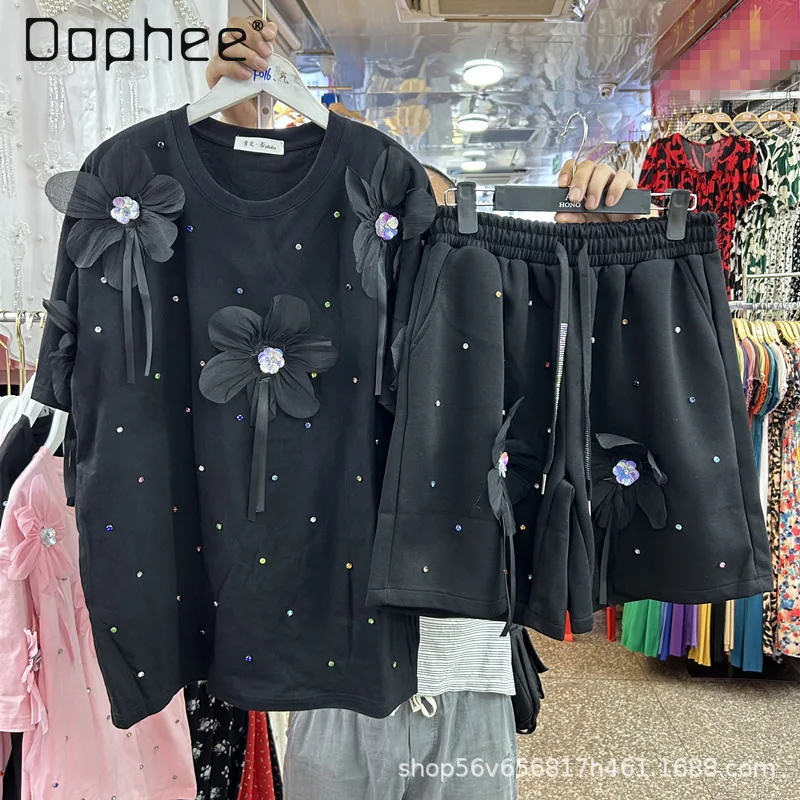 Summer Casual Suit Heavy Industry Diamond Three-dimensional Flower Short-sleeved Top Elastic Waist Wide-leg Shorts Two-piece Set
Summer Casual Suit Heavy Industry Diamond Three-dimensional Flower Short-sleeved Top Elastic Waist Wide-leg Shorts Two-piece Set